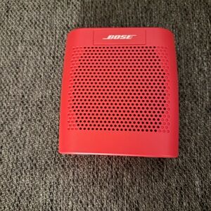 Bose Red Compact Portable Speaker with Sleek Design